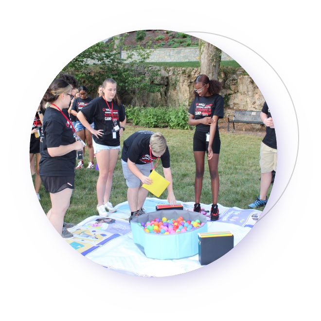 A group of high-school students playing a life-sized board game.